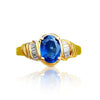 Oval Cut Blue Sapphire and Baguette Cut Diamond Engagement Ring