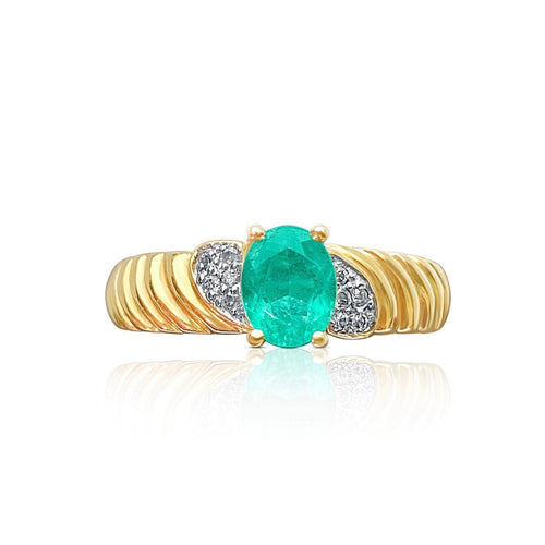 0.40 Carat Emerald Set in 14k Gold Ribbed Ring