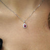 1 Carat Oval Cut Ruby & Diamond Halo Pendant Necklace in 14K White Gold