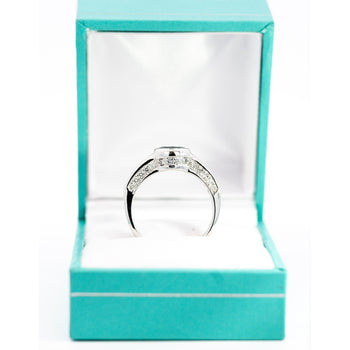 18K White Gold Bezel and Channel Set Oval Cut Blue Sapphire & Baguette Diamond Ring – Assay Jewelers