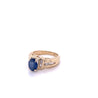 1.22 Carat Oval Cut Blue Sapphire with Baguette Cut Diamonds in 14k Gold Ring