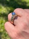 1.22 Carat Oval Cut Blue Sapphire with Baguette Cut Diamonds in 14k Gold Ring