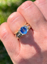 1.22 Carat Oval Cut Blue Sapphire with Baguette Cut Diamonds in 14k Gold Ring