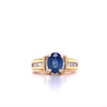 1.22 Carat Oval Cut Blue Sapphire with Baguette Cut Diamonds in 14k Gold Ring-ASSAY-ASSAY