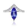 Bague incurvée en or blanc 18k avec tanzanite taille marquise