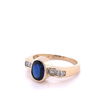 1.48 Carat Oval Cut Blue Sapphire With Princess Cut Diamond Ring in 18k Gold – Assay Jewelers
