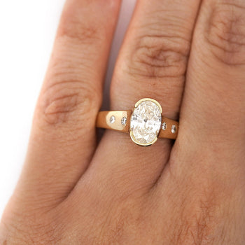 1.70 Carat J/I1 Oval Diamond and Floating Diamond Shank Engagement Ring – Assay Jewelers