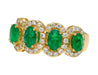 2.11 Carat Oval Cut Emerald and Diamond Wedding Band in 18K Gold