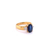 2.32 Carat Oval Cut Blue Sapphire with Trillion Cut Diamond Side stones in 18k Yellow Gold Ring-ASSAY-ASSAY