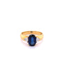 2.32 Carat Oval Cut Blue Sapphire with Trillion Cut Diamond Side stones in 18k Yellow Gold Ring-ASSAY-ASSAY