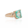 3.04 Carat Emerald Cut Emerald 14K Yellow Gold Curved Shank Solitaire Ring
