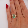 3.04 Carat Emerald Cut Emerald 14K Yellow Gold Curved Shank Solitaire Ring