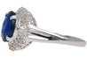 3.21 Carat Oval Cut Blue Sapphire and Diamond in Platinum Ring