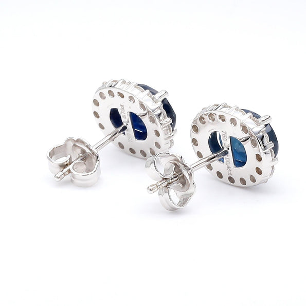 3.70 Carat Oval Dark Blue Sapphire & 0.48 Carat Diamond Halo 18K White Gold Stud