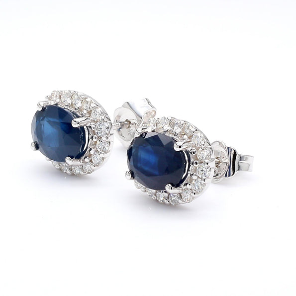 3.70 Carat Oval Dark Blue Sapphire & 0.48 Carat Diamond Halo 18K White Gold Stud