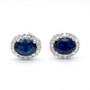 3.70 Carat Oval Dark Blue Sapphire & 0.48 Carat Diamond Halo 18K White Gold Stud