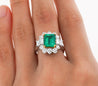 4.42 Carat TW Colombian Emerald with Round & Emerald Cut Diamond Halo Ring