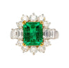 4.42 Carat TW Colombian Emerald with Round & Emerald Cut Diamond Halo Ring