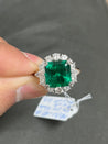 5.20 carat Minor Oil Colombian Emerald and Diamond Halo Ring