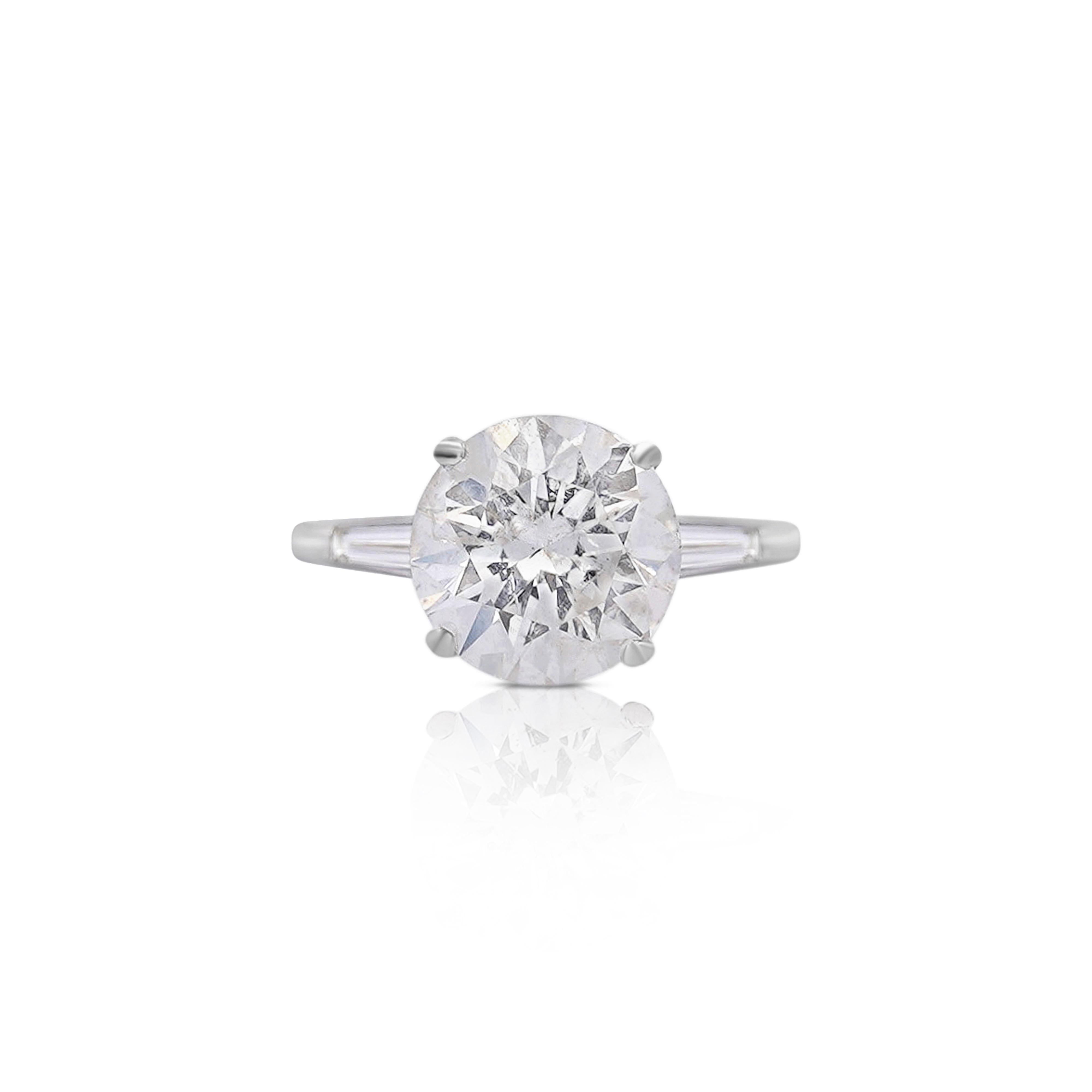 I1 Round Cut Diamond & Baguette Side 3 Stone Engagement Ring