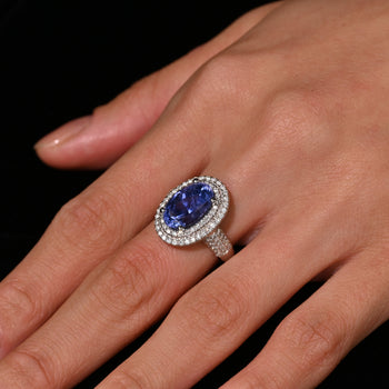 6.34 Carat No Heat Oval Cut Blue Sapphire and Diamond Halo 18K Ring GRS Certified – Assay Jewelers