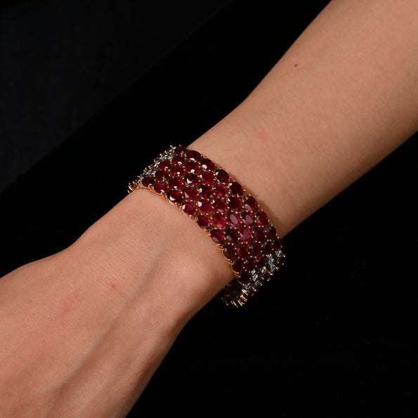 72 Carat Oval Ruby 5-Row Multi Link Tennis Bracelet in 18K Gold