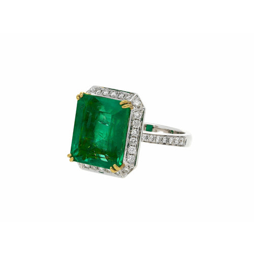 8 carat Russian Emerald in 18K White Gold Diamond Halo Ring