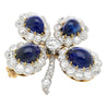 Antique GIA Certified 6 Carat Cabochon-Cut Sapphire and Diamond Floral Brooch