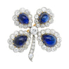 Antique GIA Certified 6 Carat Cabochon-Cut Sapphire and Diamond Floral Brooch