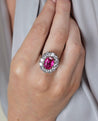 Art Deco AGL Certified No Heat 5.52 Carat Oval Cut Burma Ruby and Round Diamond Halo Ring