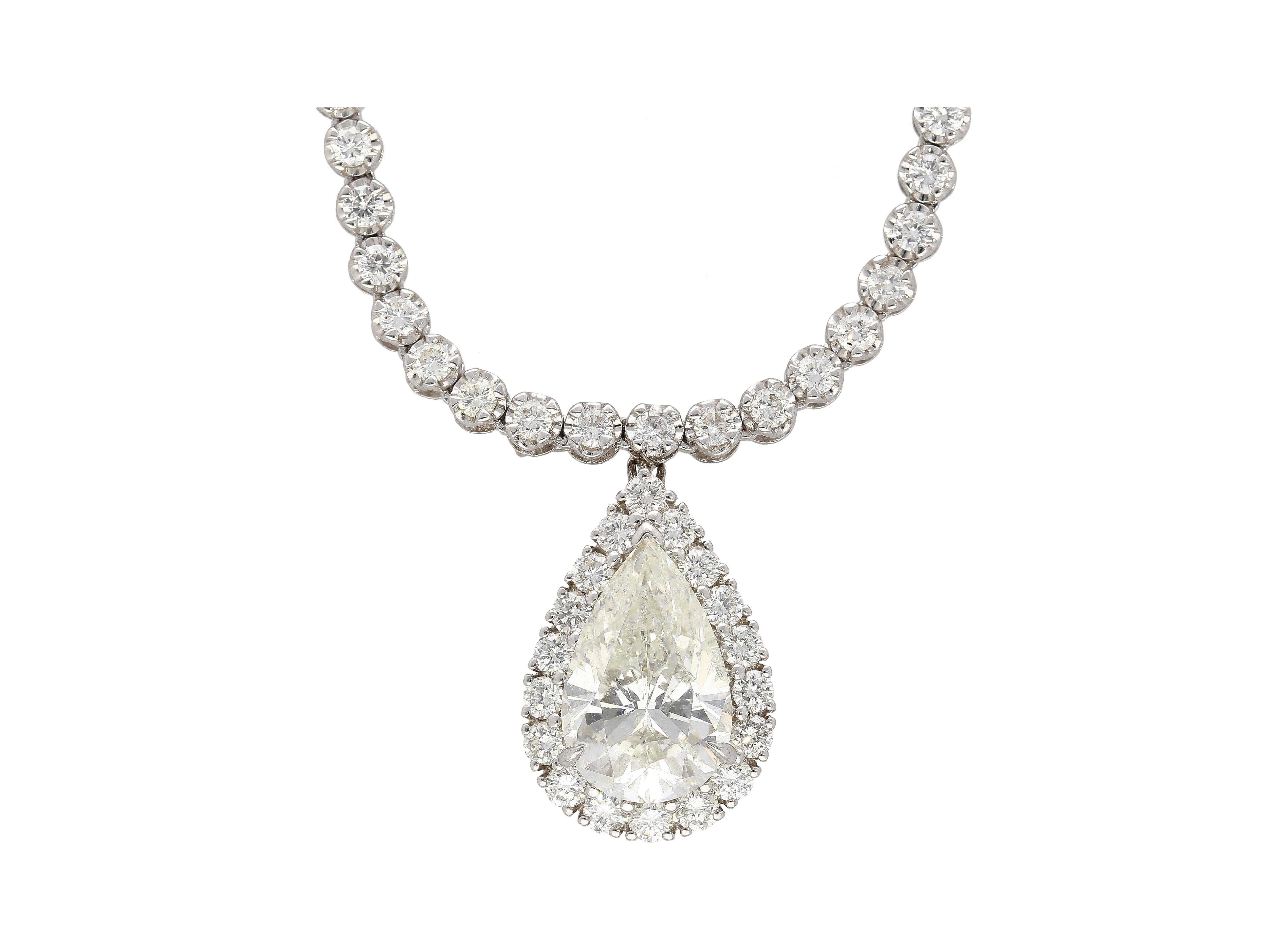 EGL Certified 5.02 Carat Pear Diamond Pendant and Diamond Halo & Sapphire Detail