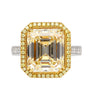 Emerald Cut Natural 7.25 Carat Fancy Light Yellow Diamond with Round Diamond Halo Ring