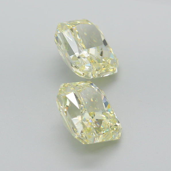 GIA Certified 10.52 Carat Fancy Light Yellow Radiant Cut Diamond Pair Loose