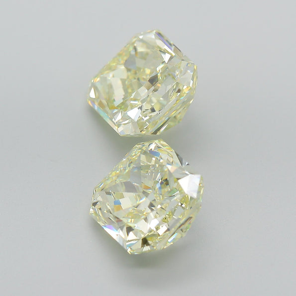 GIA Certified 10.52 Carat Fancy Light Yellow Radiant Cut Diamond Pair Loose