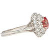 GIA Certified 1.63 Carat Padparadscha Sapphire and Diamond Halo Set Cluster Ring