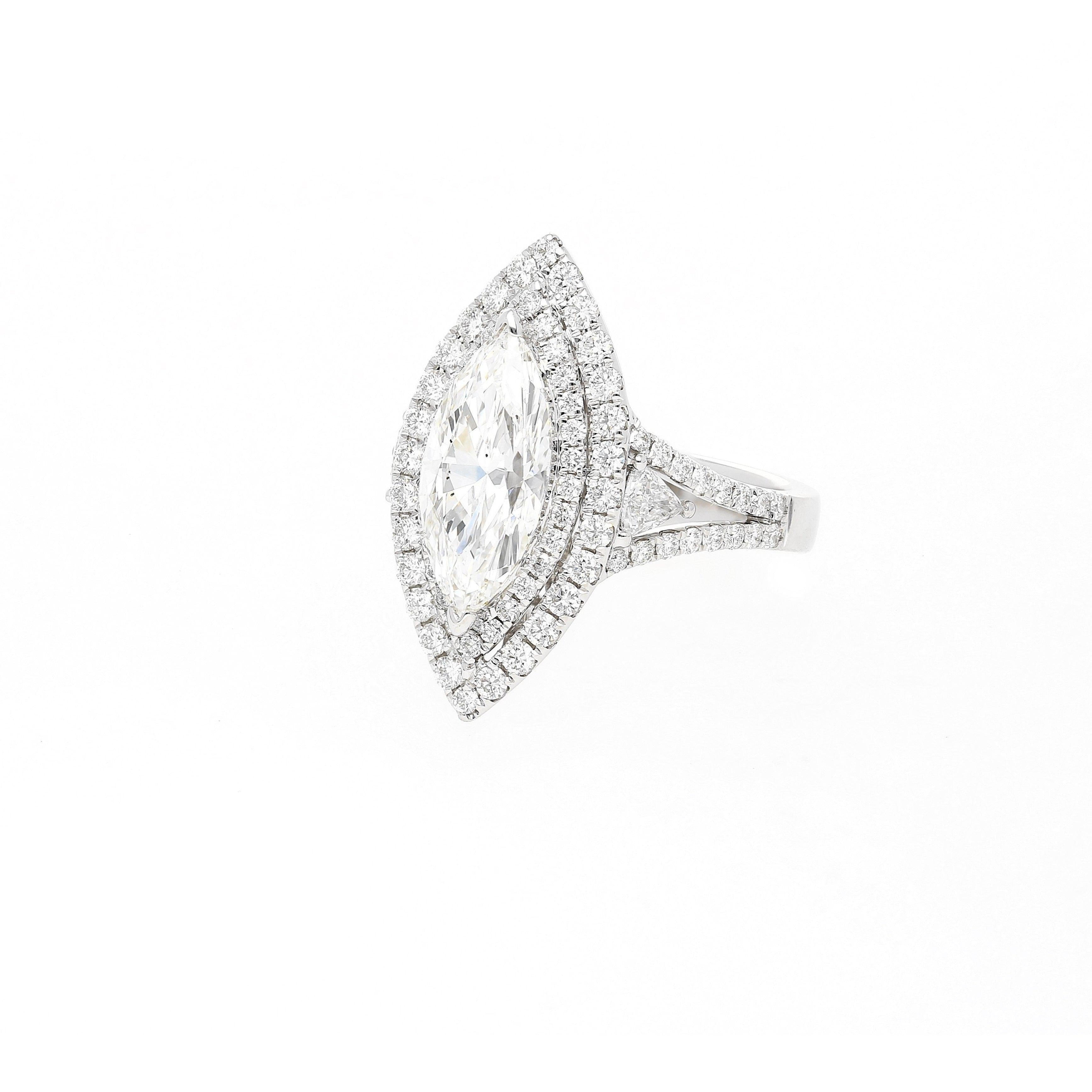 GIA Certified 2.38 Carat Marquis-Cut, H Color, Si1 Clarity Diamond set in 18k white gold and diamond halo ring - ASSAY