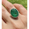 GIA certified 10 Carat Oval Cut Emerald And Diamond Halo 18k Gold Ring