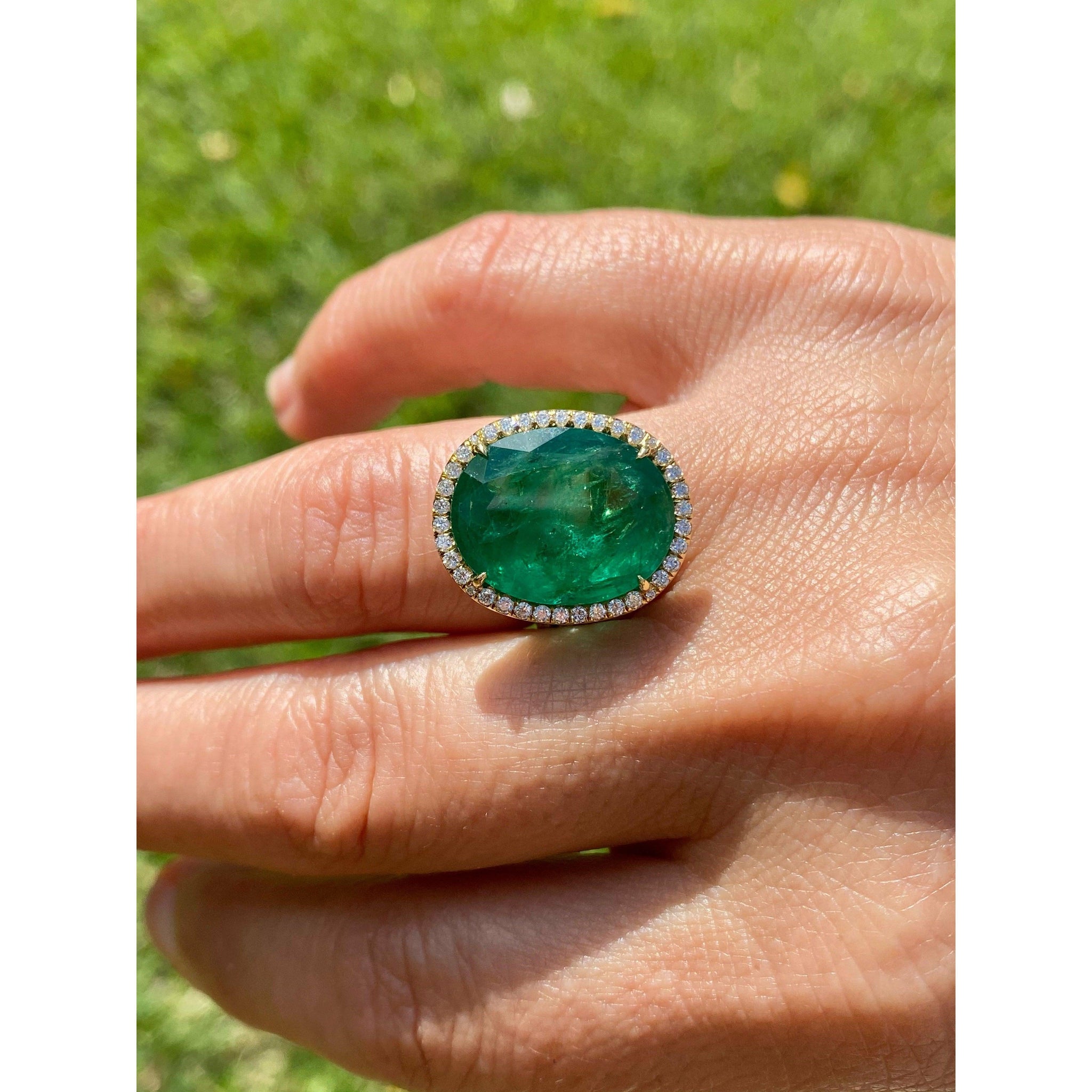 GIA certified 10 Carat Oval Cut Emerald And Diamond Halo 18k Gold
