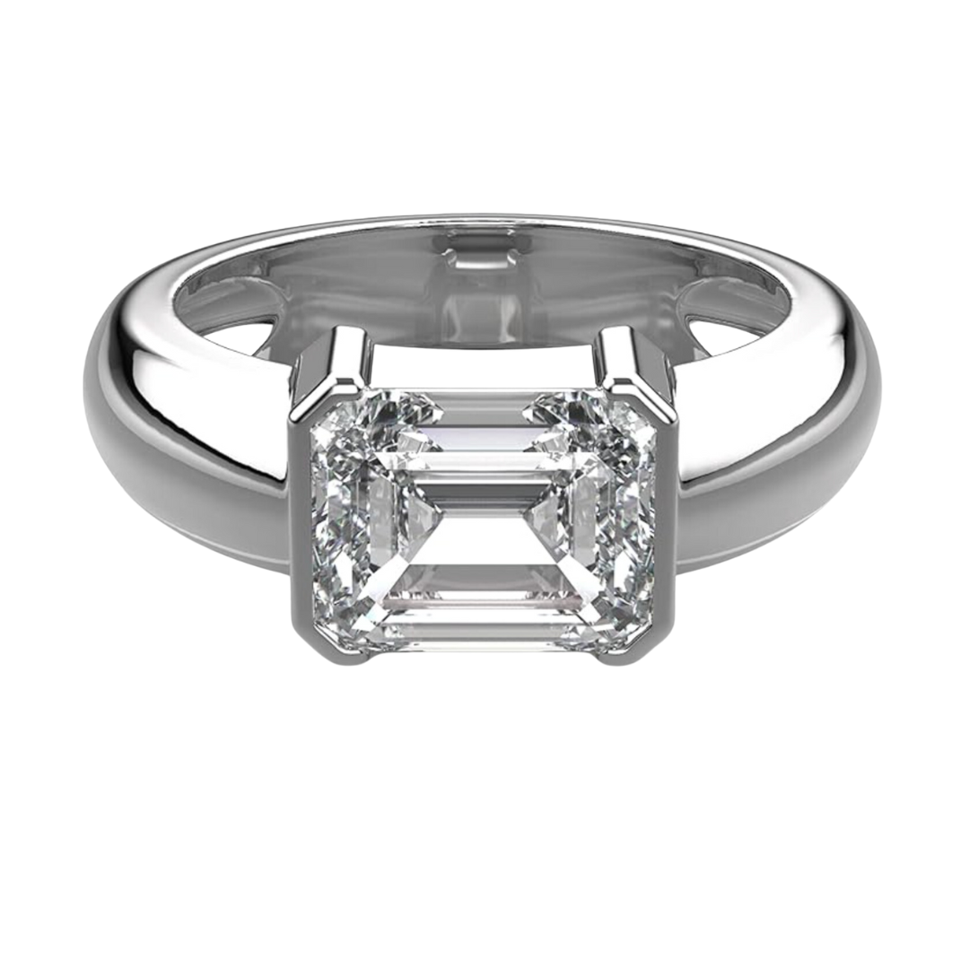 Half-Bezel-East-West-Ring-Set-With-2_5-Carat-Emerald-Cut-Lab-Grown-Diamond-Rings.png