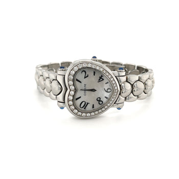 Montre Corum femme en nacre avec boîtier en forme de cœur serti de diamants – Assay Jewelers