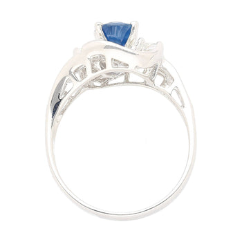Natural 1.14 Carat Oval Cut Blue Sapphire with Round & Baguette Cut Diamonds in a Swirled 18K White Gold Ring Setting – Assay Jewelers