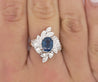 Natural 1.52 Carat Oval Blue Sapphire and Diamond Platinum Floral Ring