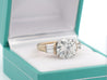 Natural 4.21 Carat Round Diamond Engagement Ring With Baguette Diamonds in Two Tone 18k Gold