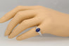 Oval cut Natural Blue Sapphire with natural baguette cut diamonds in 18k solid white gold