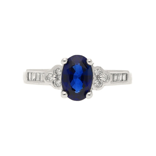 Oval cut Natural Blue Sapphire with natural baguette cut diamonds in 18k solid white gold