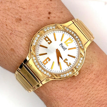 Piaget Polo Ladies 32mm Watch in 18K Yellow Gold With Diamond Bezel and Piaget Papers – Assay Jewelers