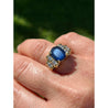 Retro Style Chanthaburi Blue Sapphire ring with Baguette Diamond Sidestones