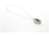 Vintage Art Nouveau Style Carved 18K White Gold Pendant Necklace With Shield Cut Emerald and Diamond Side Stones