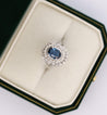 Vintage Platinum 1.18 Carat Oval Blue Sapphire & Diamond Halo Filigree Ring