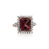 Vivid Pink 7 Carat Radiant Cut Tourmaline Ring with Round Diamond Halo in 18K Gold